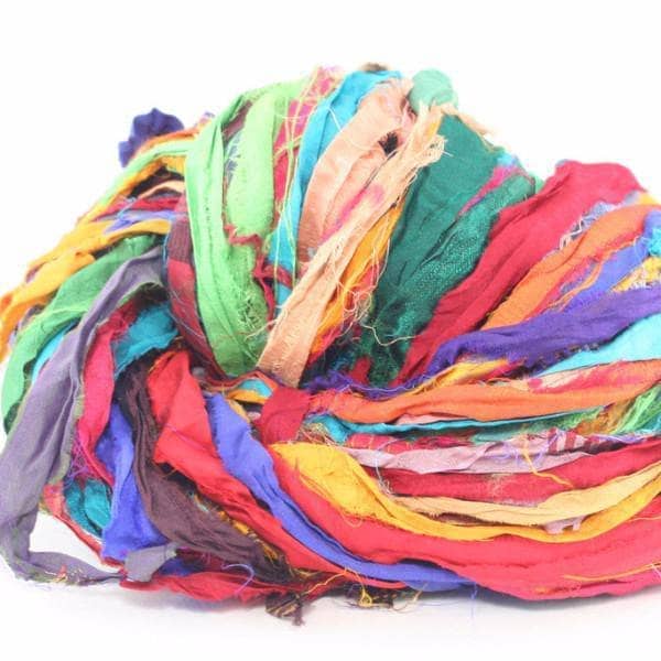 At The Bahamas (multicolored) sari silk ribbon yarn ball on a white background