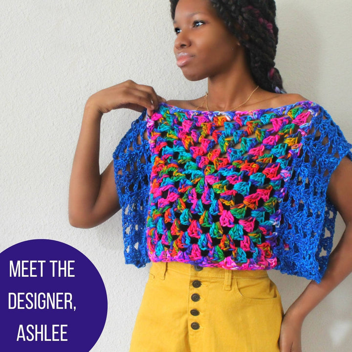 A woman wearing astral crochet granny square top pattern.