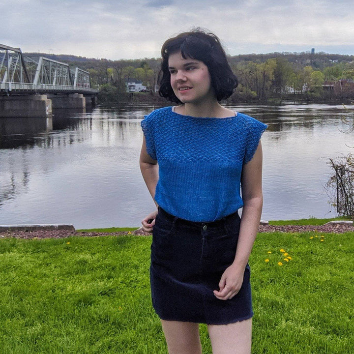 women wearing a blue top outside