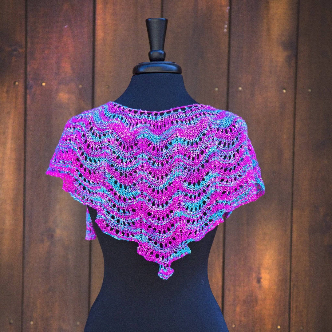 multicolored Fan Shell Shawlette over a black mannequin