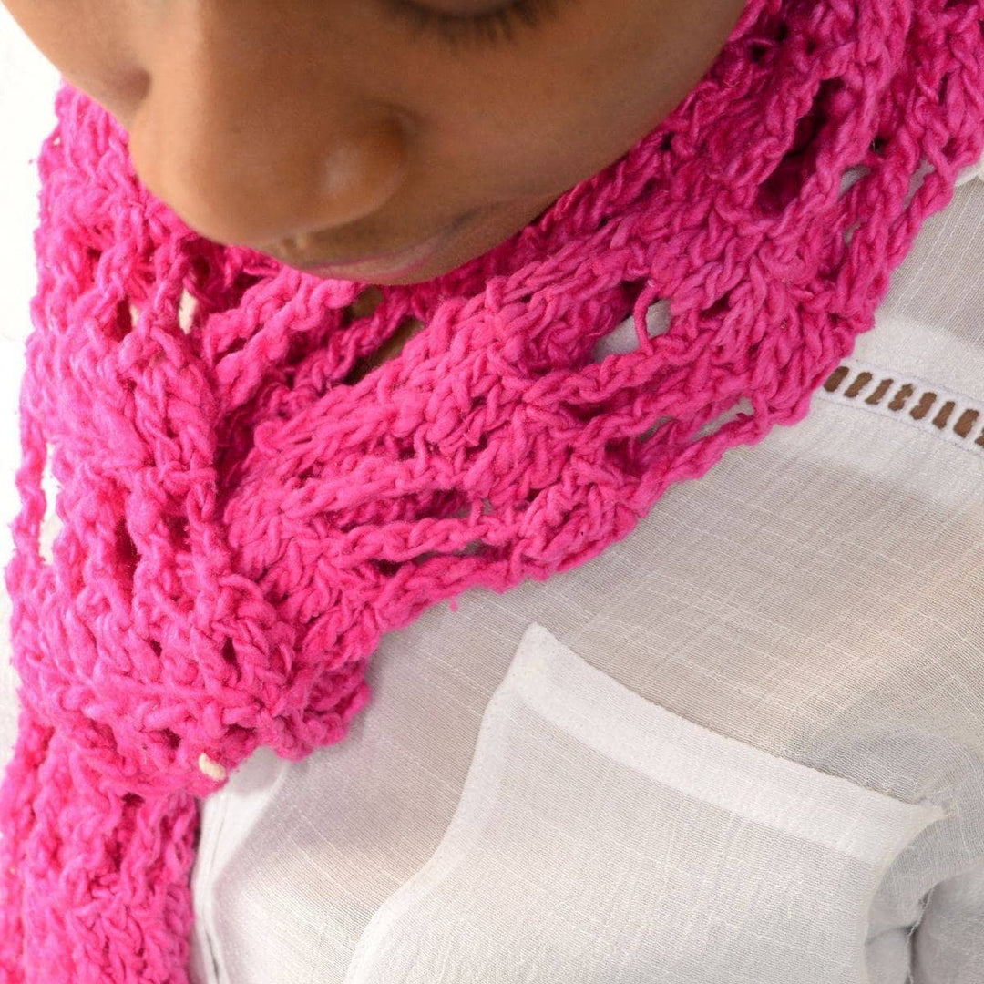 woman wearing a pink Skinny Scarf 