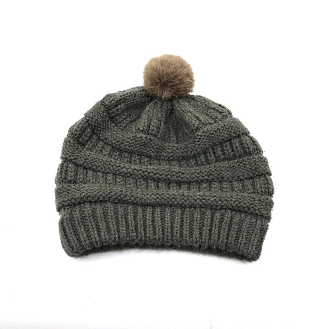 Gray beanie with faux fur pom pom on a white background