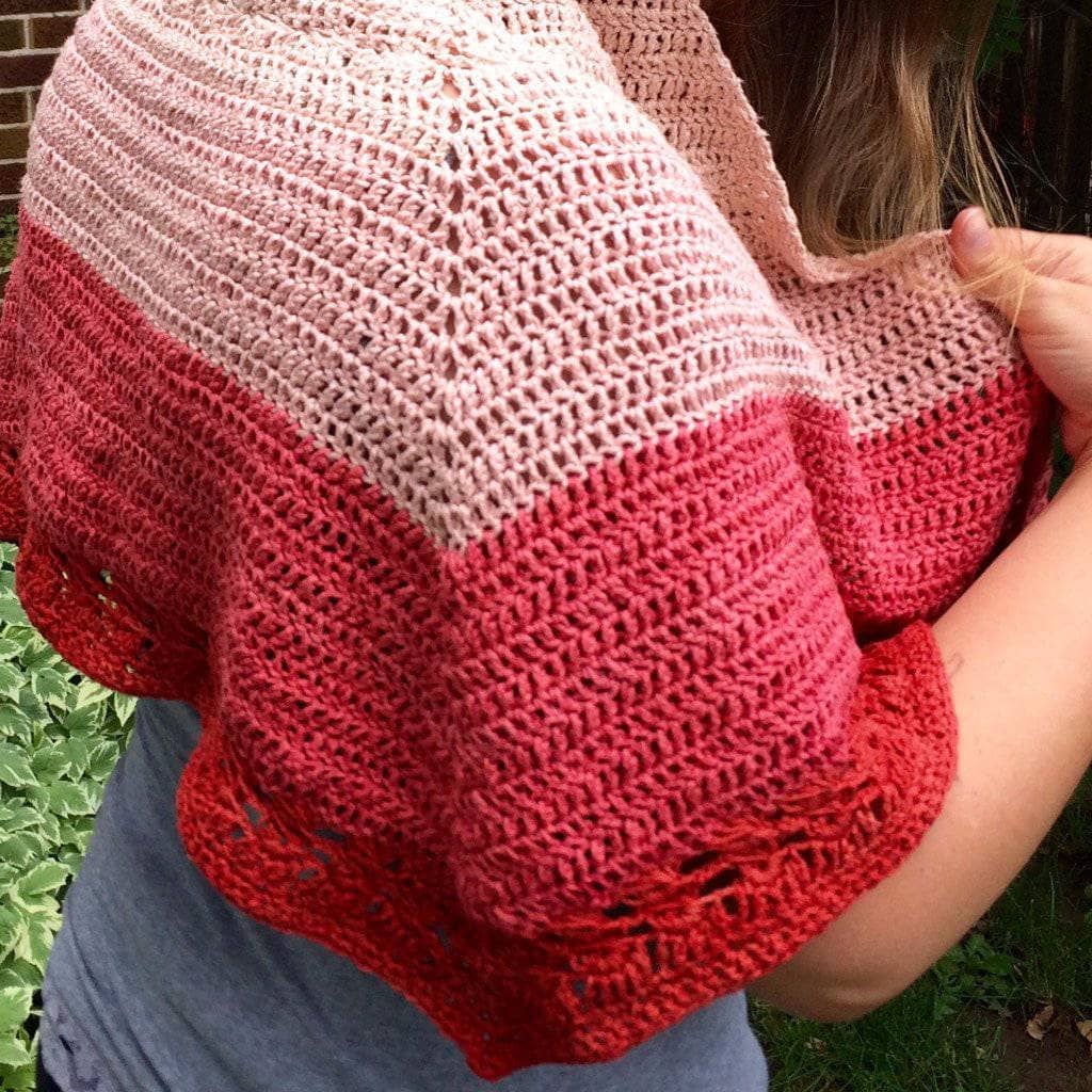 close up of woman wearing the Herbal Sunrise Shawl