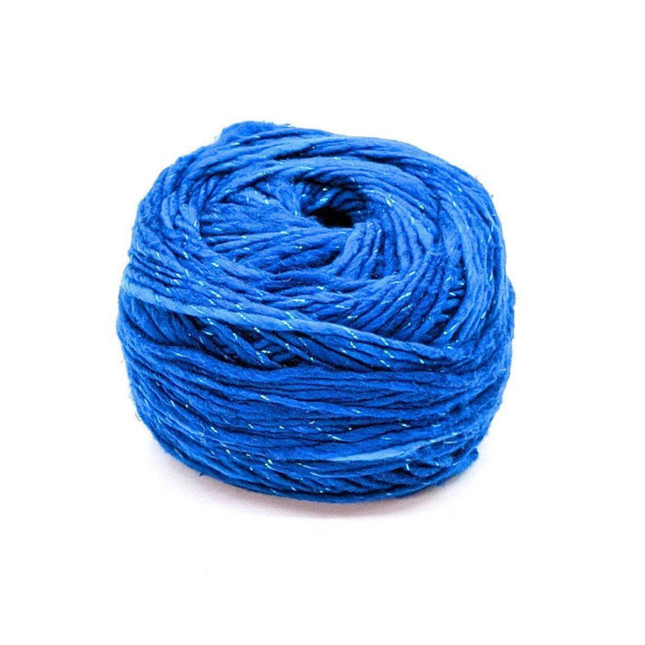 A cake of sparkle blue yarn on a white background