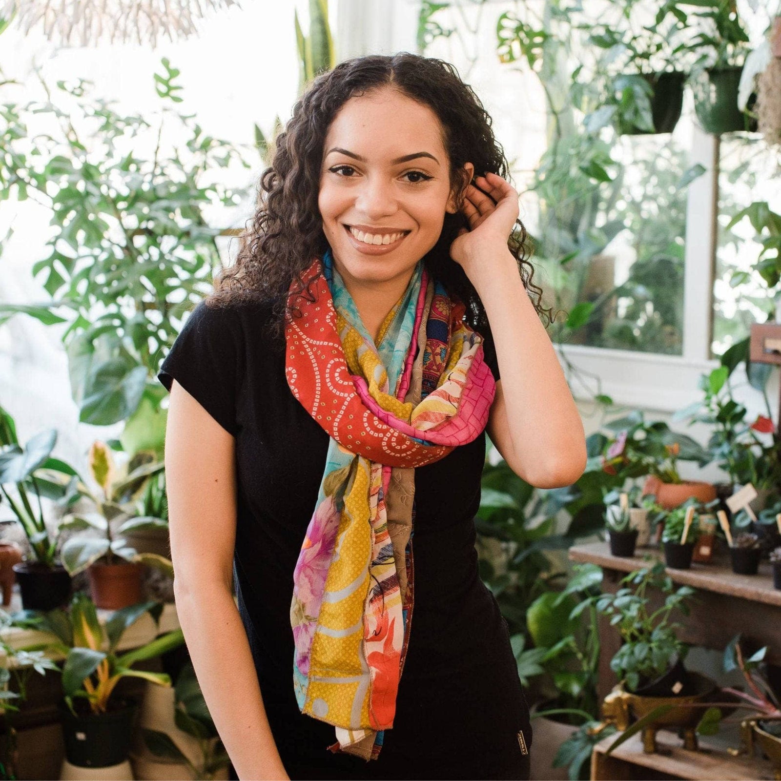 Woman wearing a medley scarf around her neck