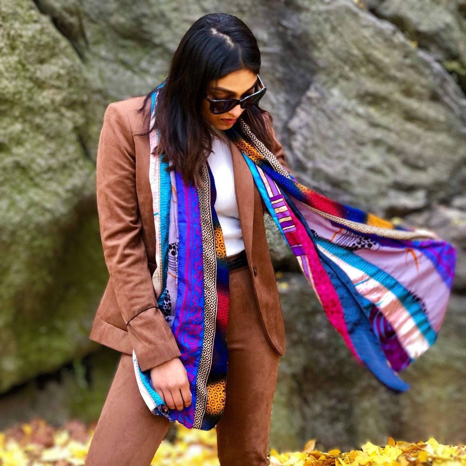 Woman wearing a cool tone sari scarf on her shoulders