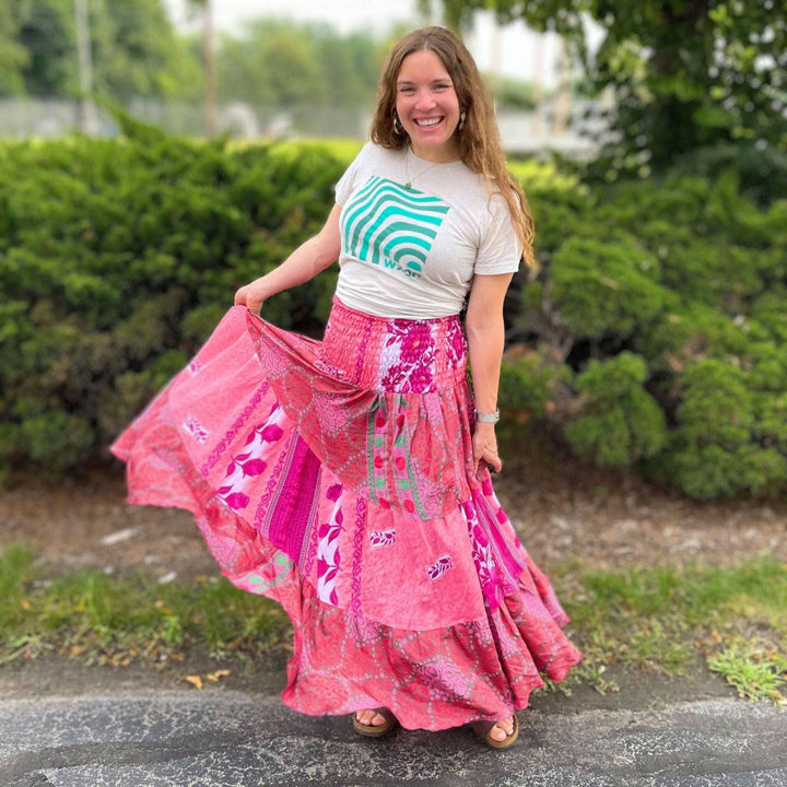 Woman wears pink sedona dress