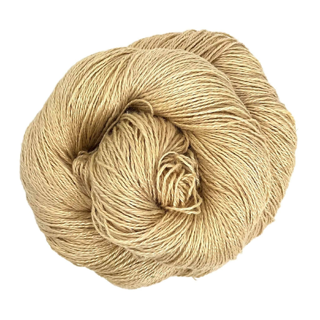 A skein of sport weight 2-Ply Linen Yarn in the colorway "Shell" on a white background.