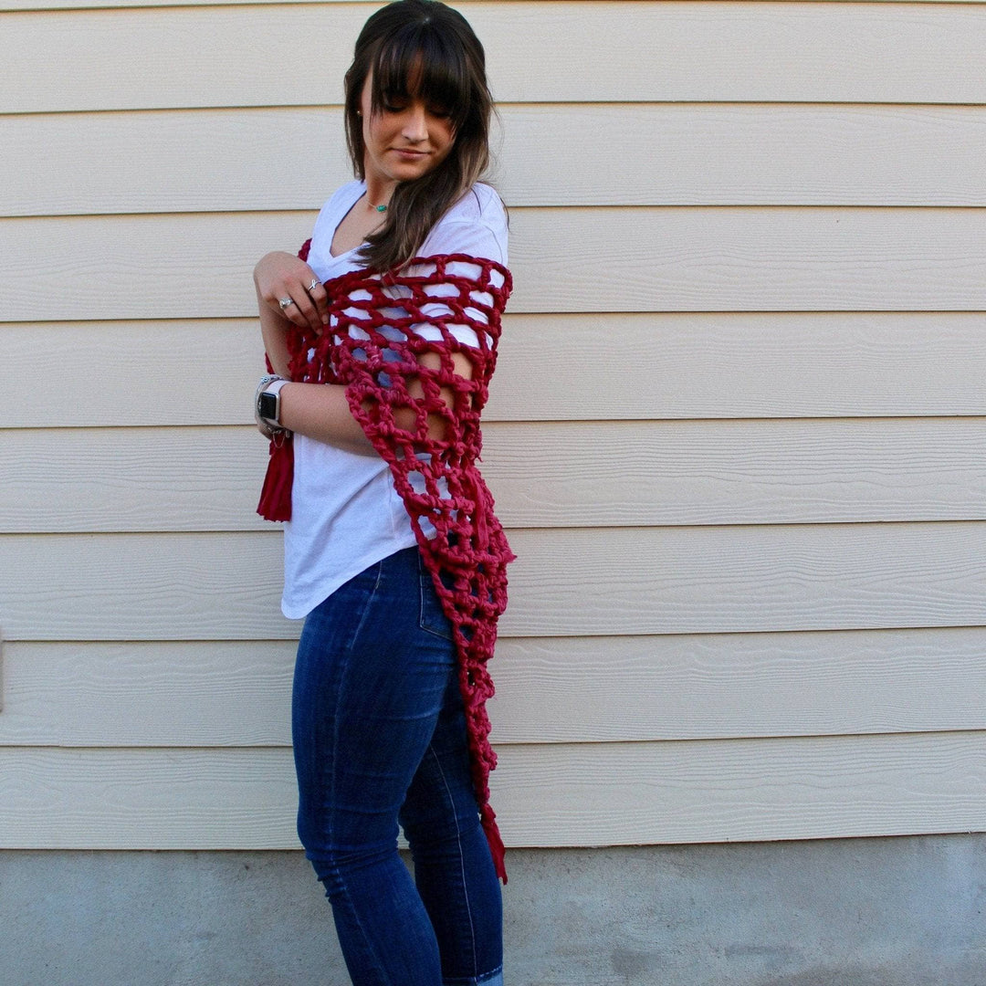 Woman wearing Summer Nights Chiffon Crochet Shawl in front of a beige wall