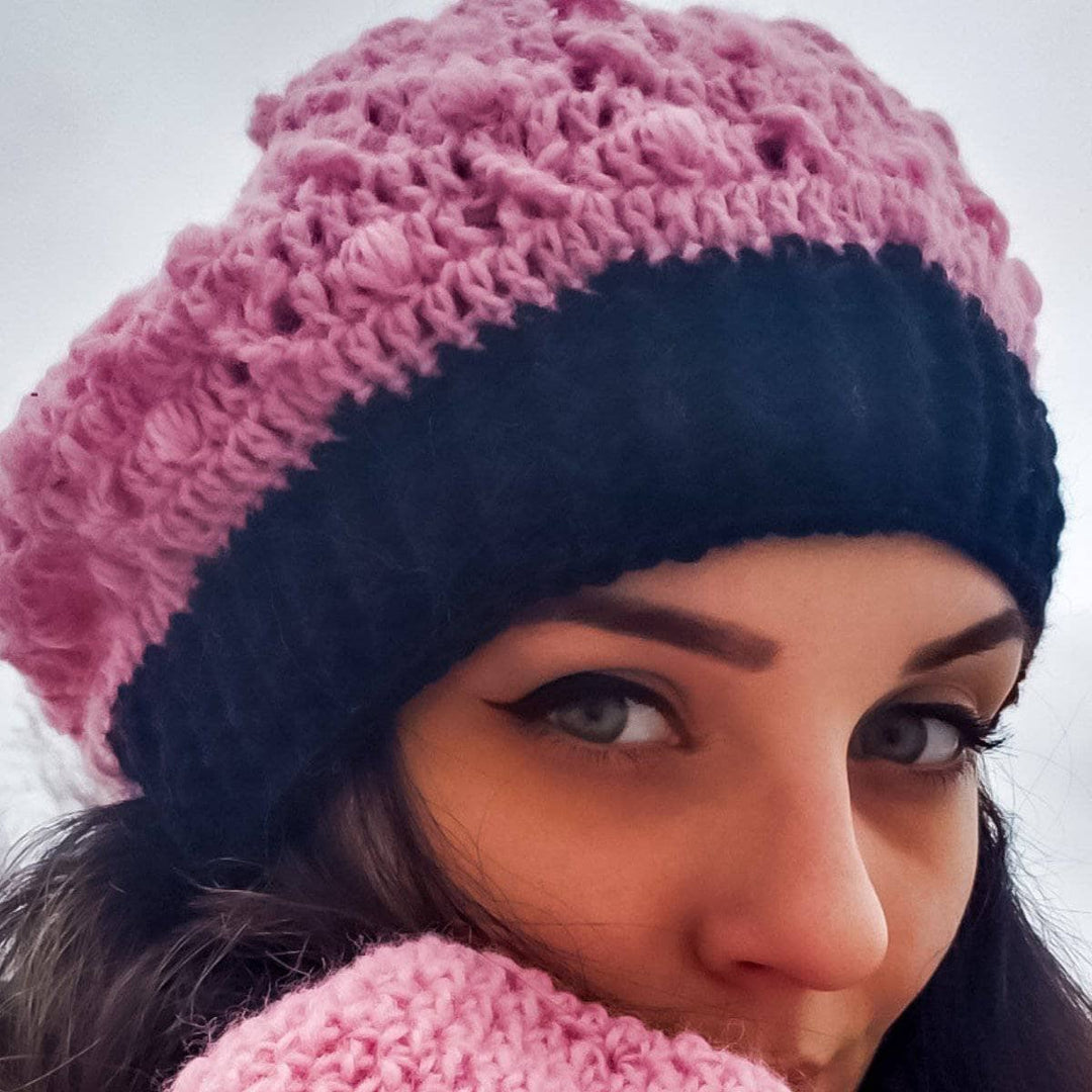 Woman wearing X's and O's Beanie and Mittens in pink