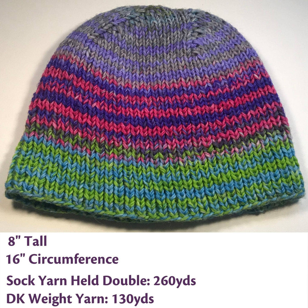 Specs and Yardage requirements photo. Boss Beanie in purple, grey pink, blue and green in front of a white background. The text below reads 8 inches tall, 16 inch circumference. Sock yarn held double: 260 yards, Dk weight yarn 130 yards. 