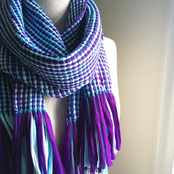 KiUV Stripes T-Shirt woven Scarf in blue and purple on a mannequin in front of a white wall