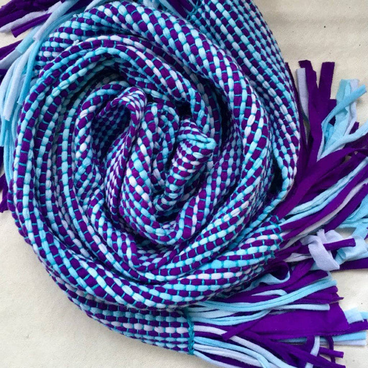 KiUV Stripes T-Shirt woven Scarf in blue and purple rolled on a white background